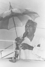 Cheddi Jagan speaking in the rain