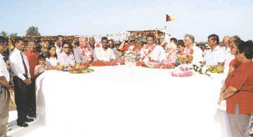 Hundreds attend wreath-laying ceremony at Babu John March 3, 2002 